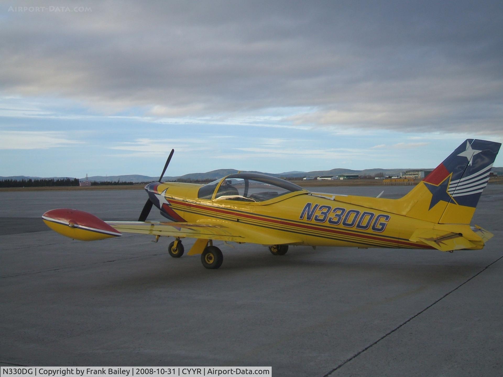 N330DG, 1991 SIAI-Marchetti SF-260D C/N 766, Parked at Woodward Aviation F.B.O. Goose Airport NL