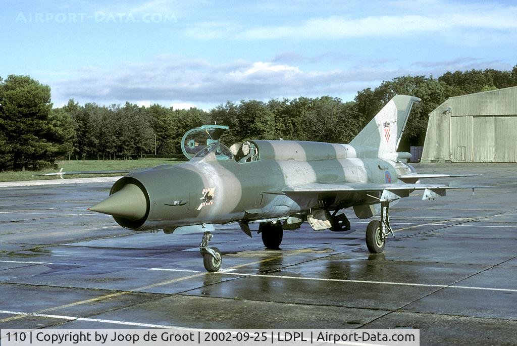 110, Mikoyan-Gurevich MiG-21bis C/N 75017895, 22 EBA markings. It was worth waiting for the rain to clear. Eventually this resulted in some fine sunny shots of these rare aircraft. By the way: the serial number is hand written in the main wheel bay.
