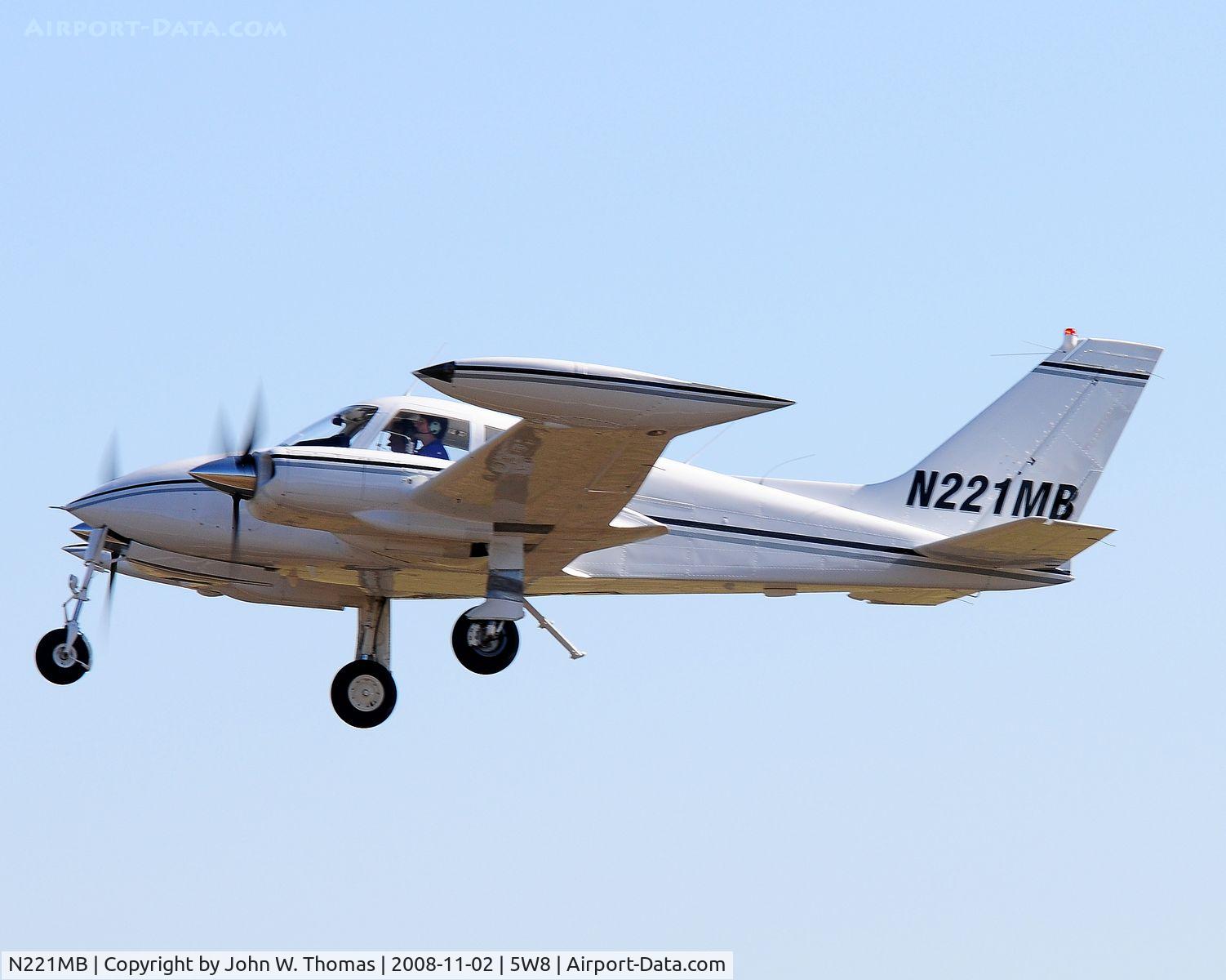 N221MB, 1966 Cessna 310L C/N 310L-0021, Departing runway 4