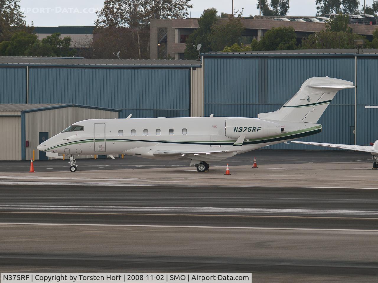 N375RF, 2004 Bombardier Challenger 300 (BD-100-1A10) C/N 20025, N375RF parked on the tarmac in Santa Monica