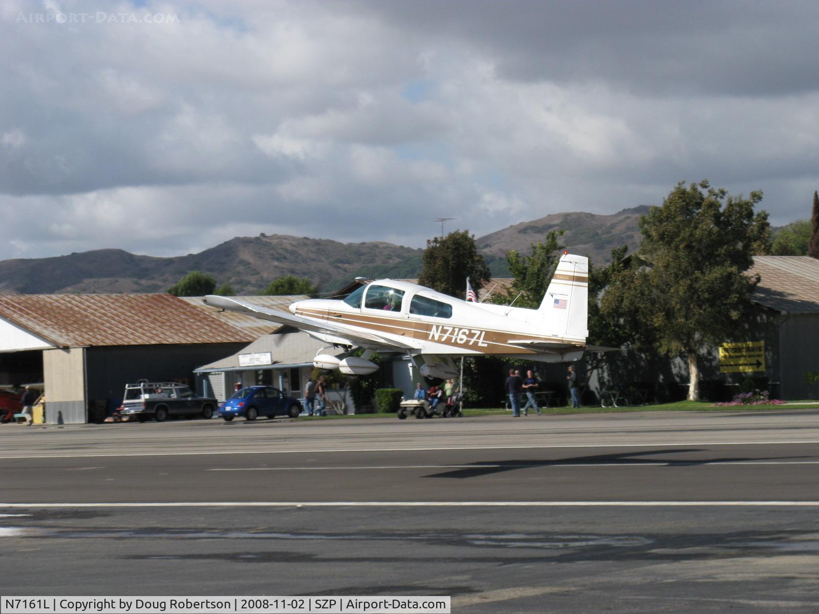 N7161L, Grumman American AA-5 Traveler C/N AA5-0461, 1973 Grumman American AA-5 TRAVELER, Lycoming O-320 150 Hp, takeoff climb Rwy 22