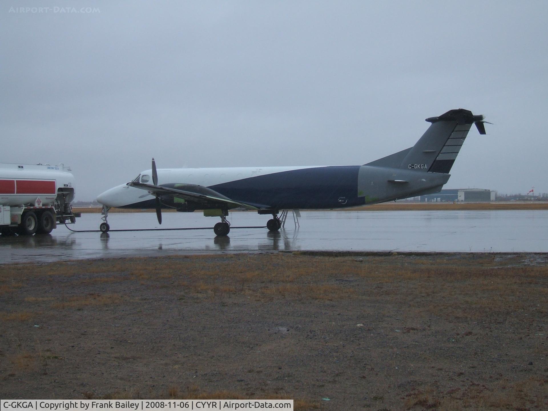 C-GKGA, 1990 Beech 1900C-1 C/N UC-117, Parked at Woodward Aviation F.B.O.  ( Partly New Painted)