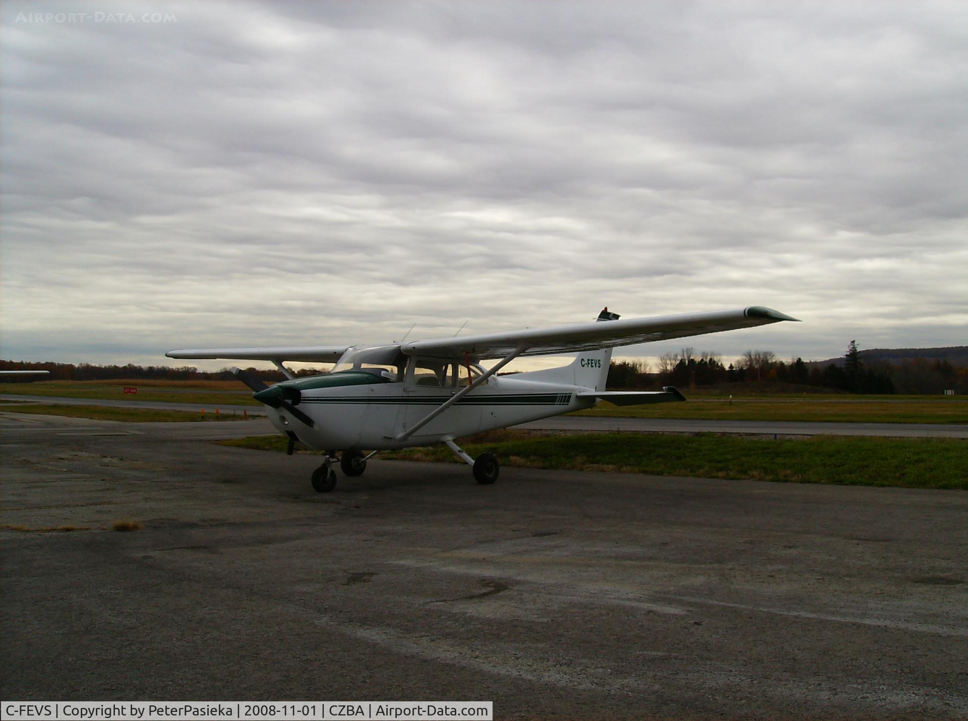 C-FEVS, 1974 Cessna 172M C/N 17262869, Spectrum Airways training aircraft, Burlington Airport, Ontario Canada