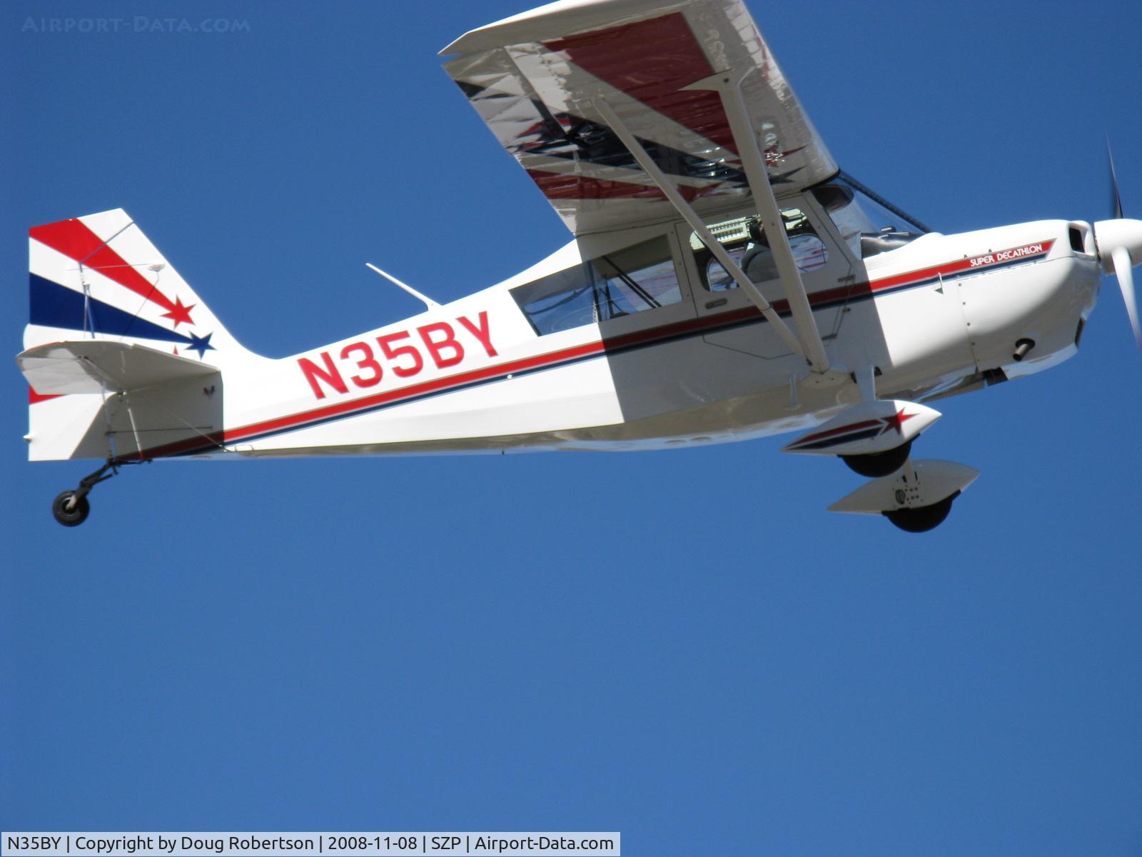 N35BY, 2005 American Champion 8KCAB Super Decathlon C/N 998-2005, 2005 American Champion 8KCAB SUPER DECATHLON, Lycoming AEIO-360-H1B 180 Hp, CS prop, near symmetrical airfoil wing, takeoff climb Rwy 04