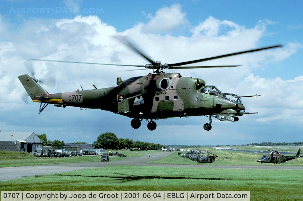 0707, Mil Mi-24V Hind E C/N 730707, The Slovak AF was present at the Belgian heli days with this Mi-24. In the background is the flightline with other participating heli's.