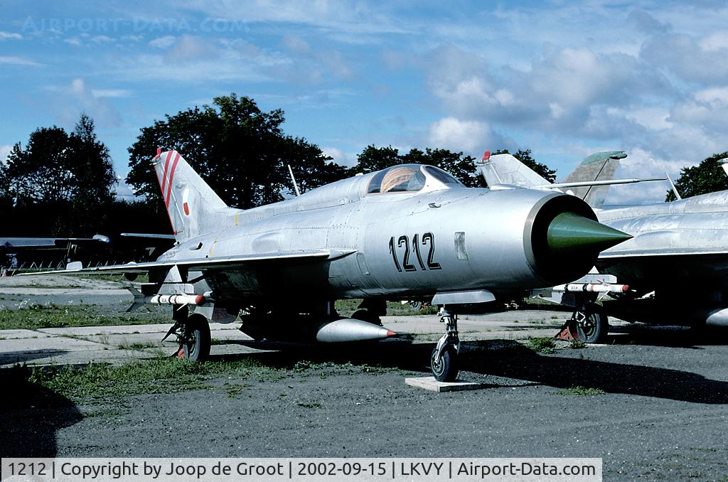 1212, Mikoyan-Gurevich MiG-21PF C/N 761212, This preserved MiG-21PF shows some commander markings on the fin. It is one of the great many aircraft preserved in the local museum, but one of the few to be decently photographed.
