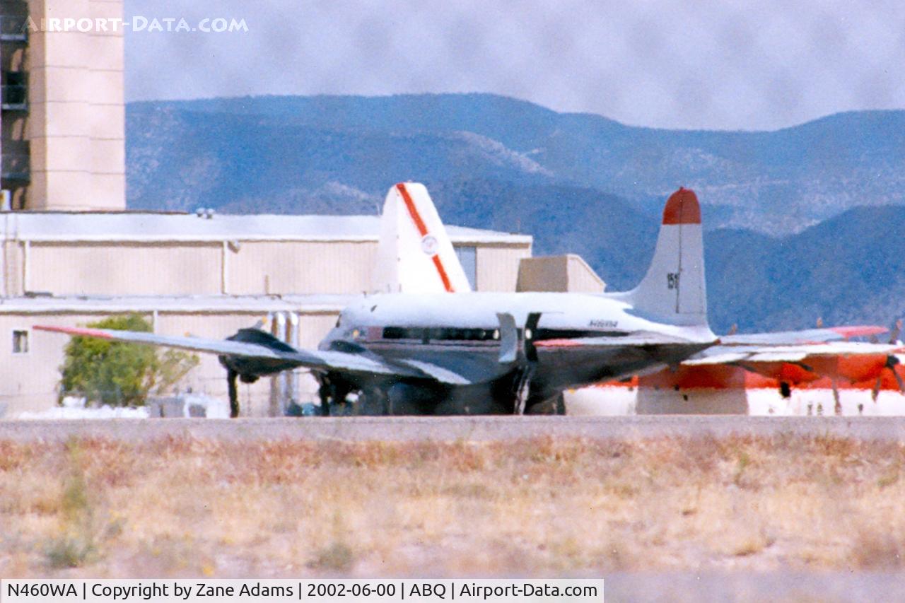 N460WA, Douglas C-54E Skymaster (DC-4) C/N 27359/DO305, At Albuquerque (Sorry about shooting through the fence it was too high to see over)