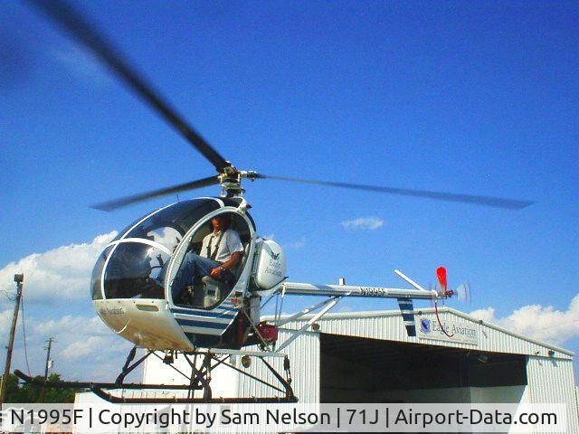 N1995F, 1985 Schweizer 269C C/N S1193, N1995F at the Eagle Aviation Ramp in Ozark Al.
