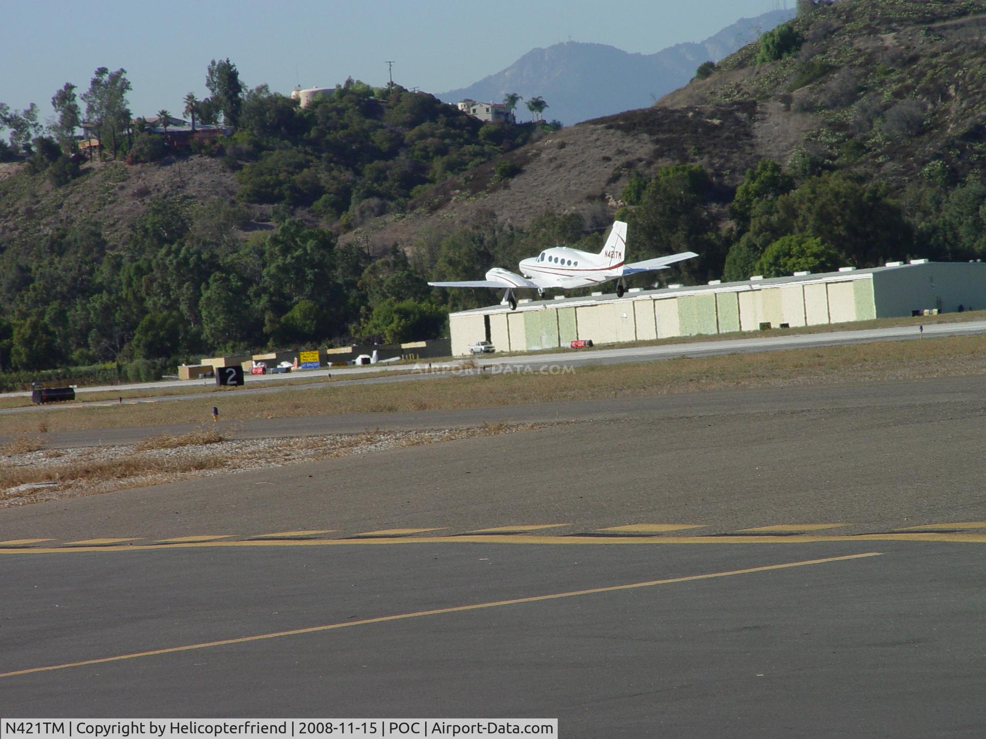 N421TM, 1976 Cessna 421C Golden Eagle C/N 421C0241, Lifting off from Brackett