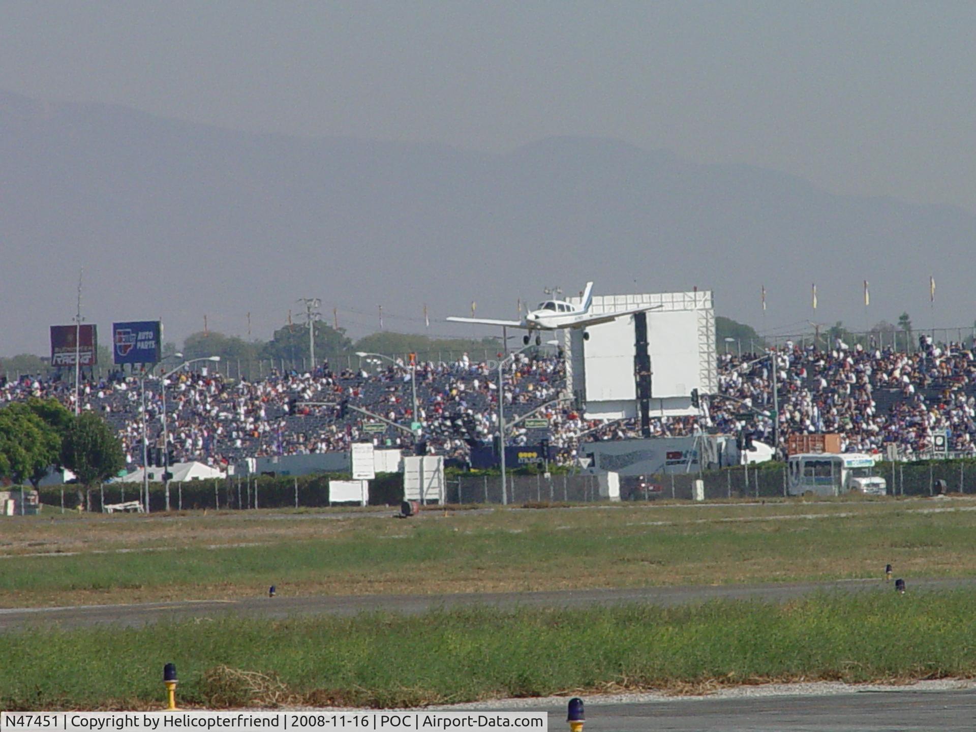 N47451, 1977 Piper PA-28-181 C/N 28-7890076, Inbound Brackett passing Drag Racing fans