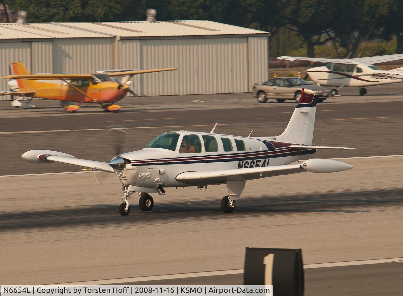 N6654L, 1979 Beech A36TC Bonanza 36 C/N EA-50, N6654L departing from RWY 21