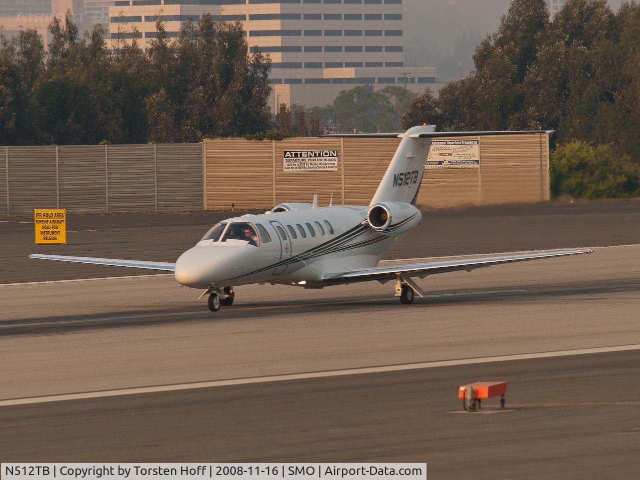 N512TB, 2002 Cessna 525A CitationJet CJ2 C/N 525A0084, N512TB departing from RWY 21 into a sky full of smoke from wildfires.