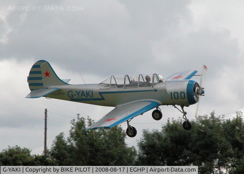 G-YAKI, 1986 Bacau Yak-52 C/N 866904, COMING IN FOR RUNWAY 26