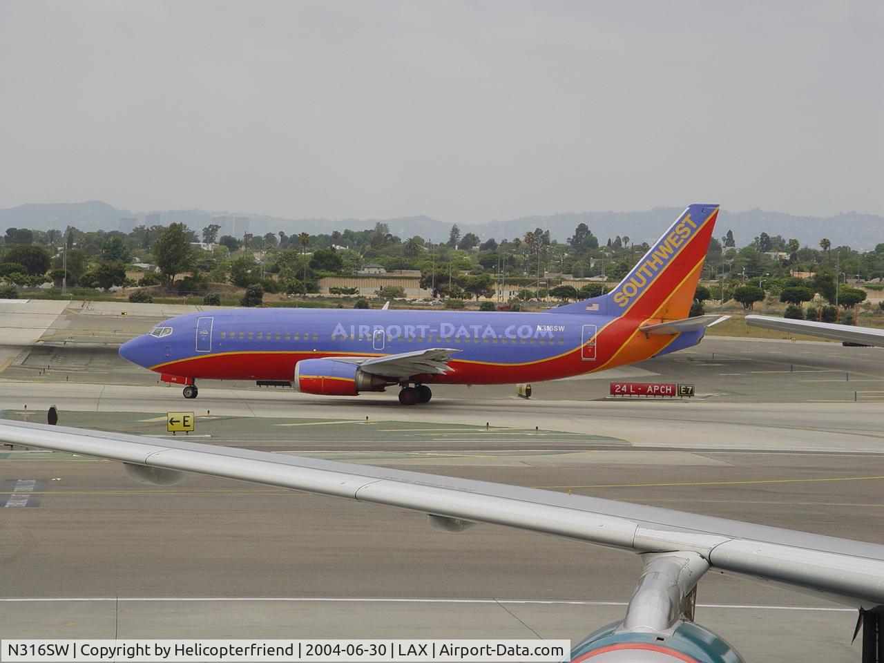 N316SW, 1986 Boeing 737-3H4 C/N 23338, Waiting for take off clearance