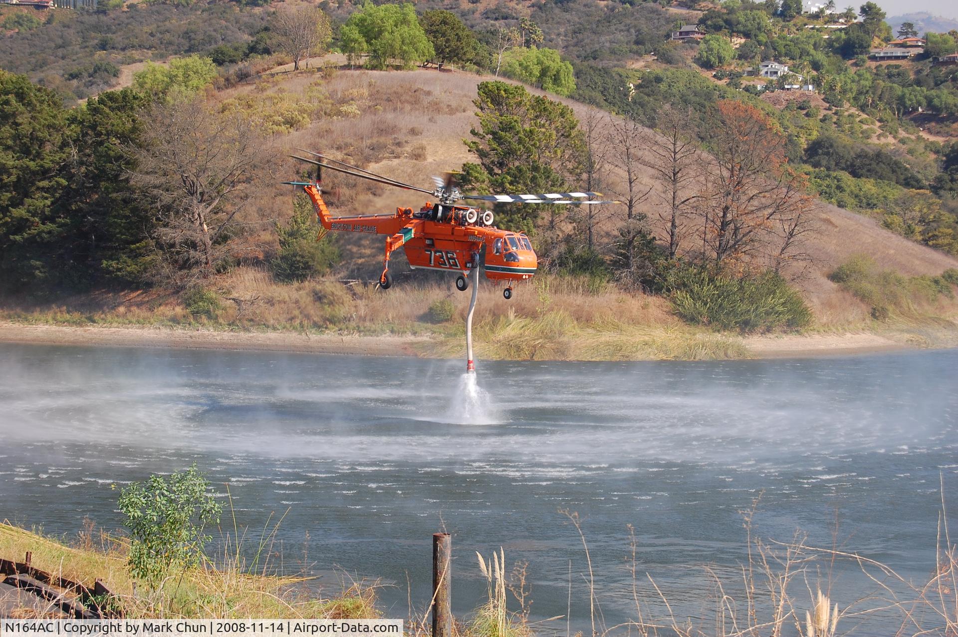 N164AC, 1968 Sikorsky S-64E C/N 64034D, Taking off after filling tank at Lauro Reservoir, Santa Barbara, CA while fighting Tea Fire.