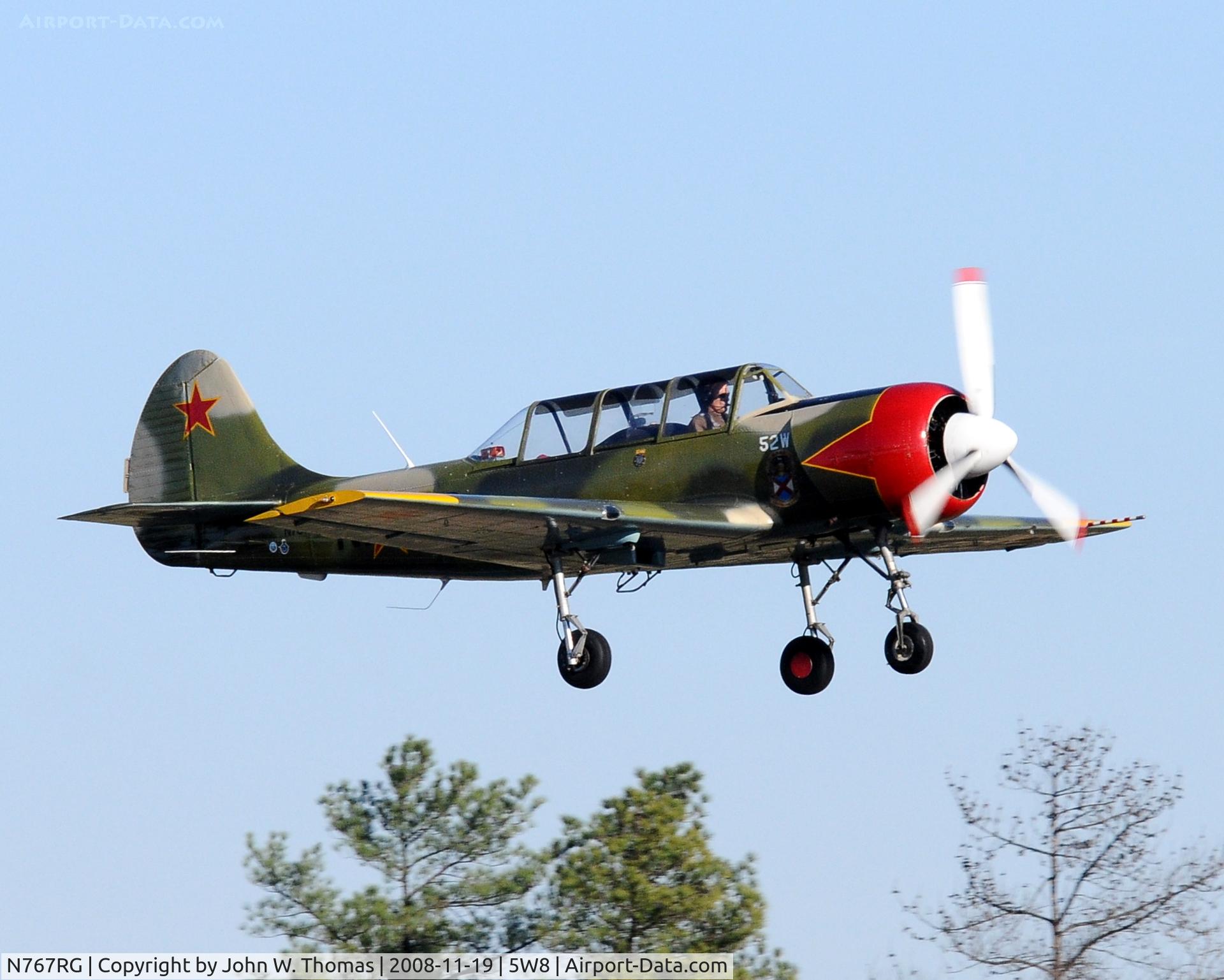 N767RG, 2000 Yakovlev (Aerostar) Yak-52W C/N 0012208, Departing runway 22