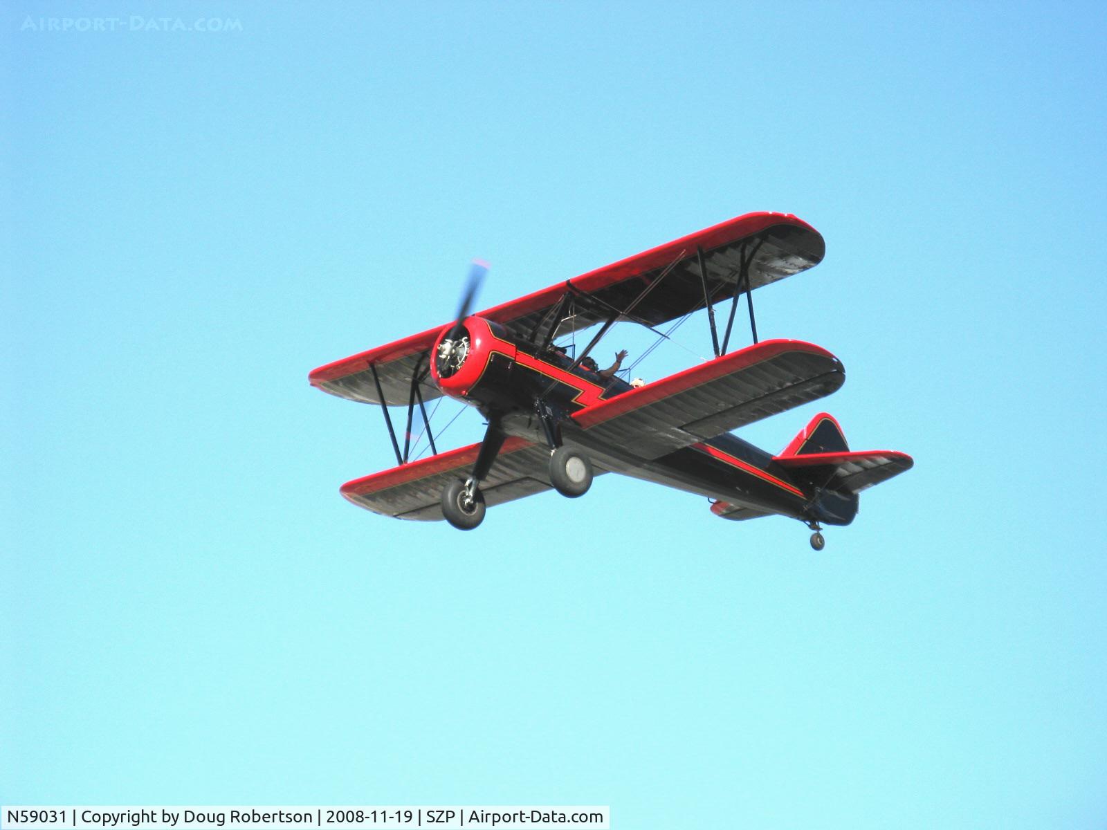 N59031, 1941 Boeing A75N1(PT17) C/N 75-3808, 1941 Boeing Stearman A75N1 (PT-17), Continental W670 220 Hp, takeoff climbout Rwy 22