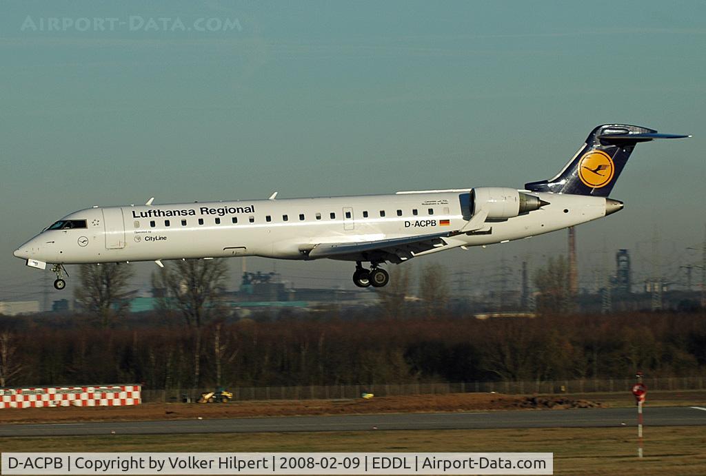 D-ACPB, 2001 Canadair CRJ-701ER (CL-600-2C10) Regional Jet C/N 10013, on final at dus