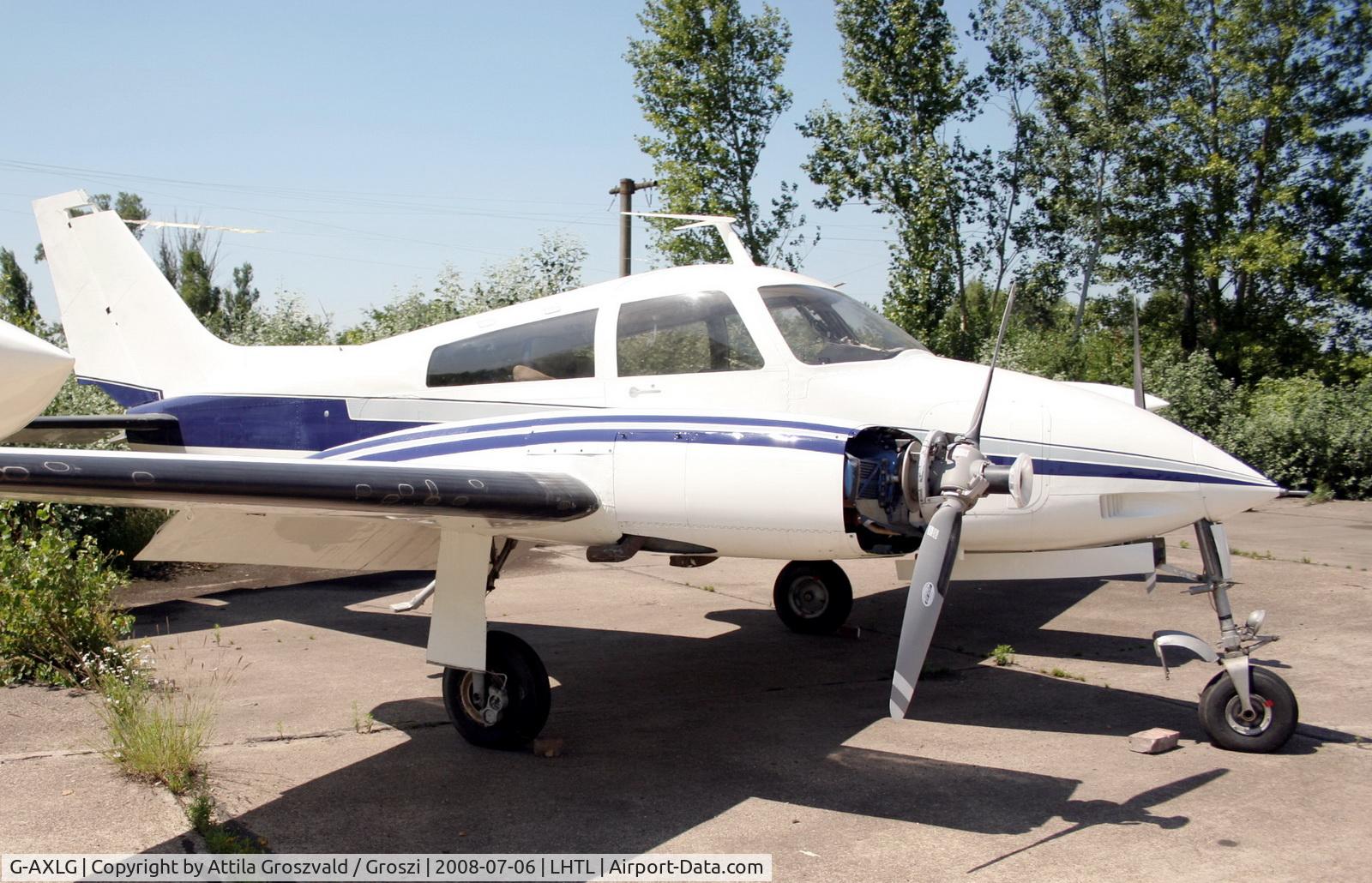 G-AXLG, 1966 Cessna 310K C/N 310K0204, Tököl airport, Hungary. Hangar number 27. Deregistered
