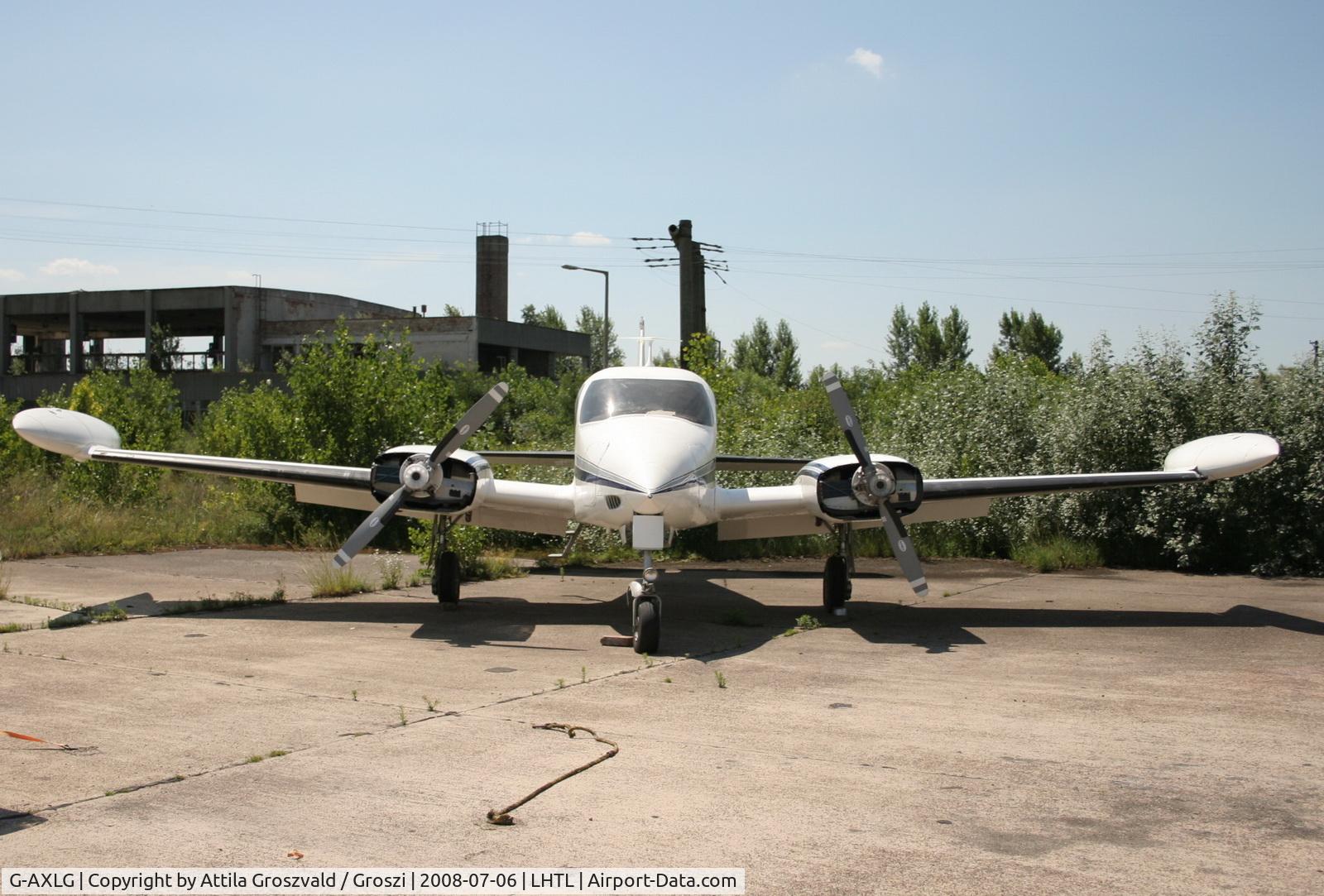 G-AXLG, 1966 Cessna 310K C/N 310K0204, Tököl airport, Hungary. Hangar number 27. Deregistered