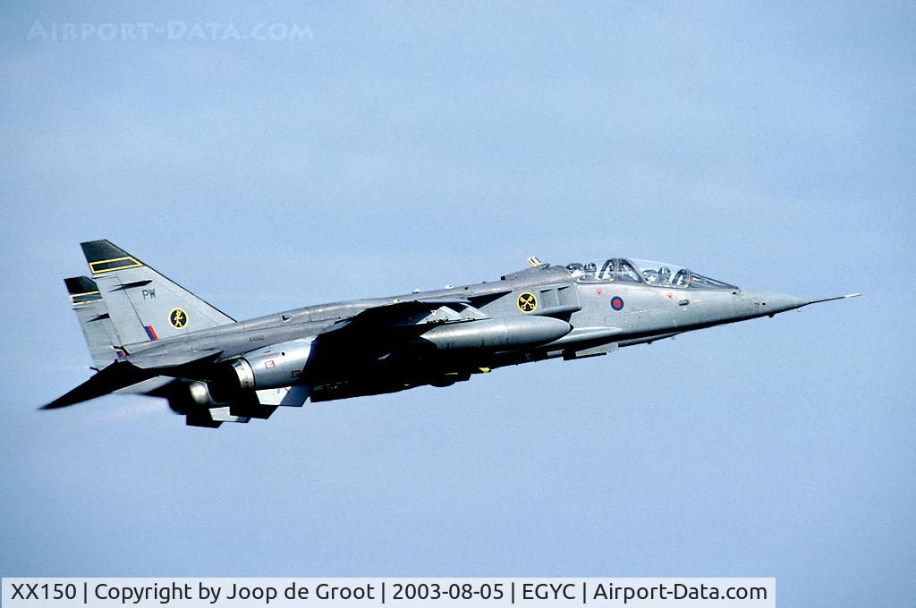 XX150, Sepecat Jaguar T.4 C/N B.15, With easterly winds the Jaguard departed low over the barrier at the runways end. These two are just getting airborne.