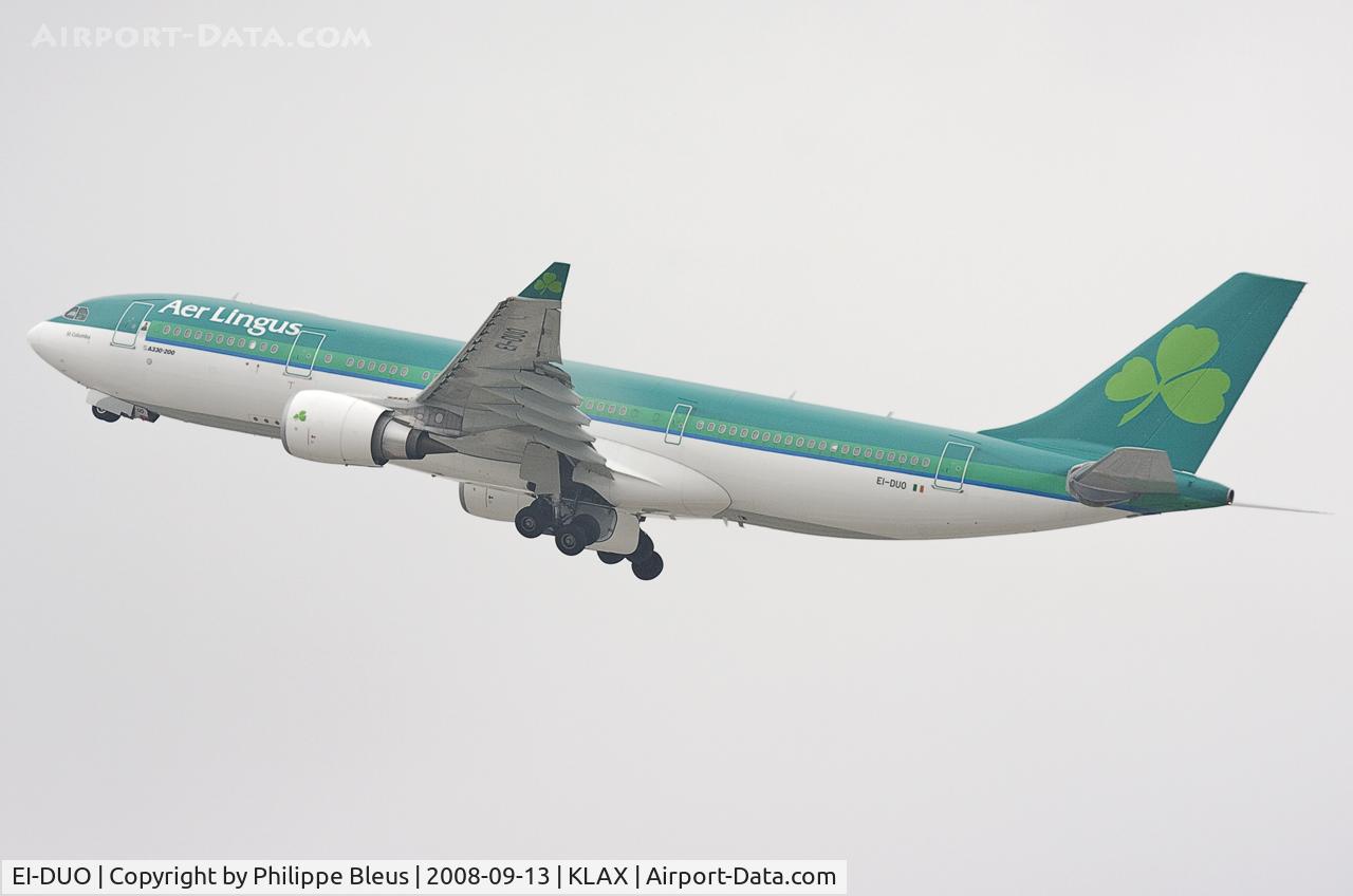 EI-DUO, 2007 Airbus A330-202 C/N 841, St Columba climbing from rwy 25R. Gear on the move.