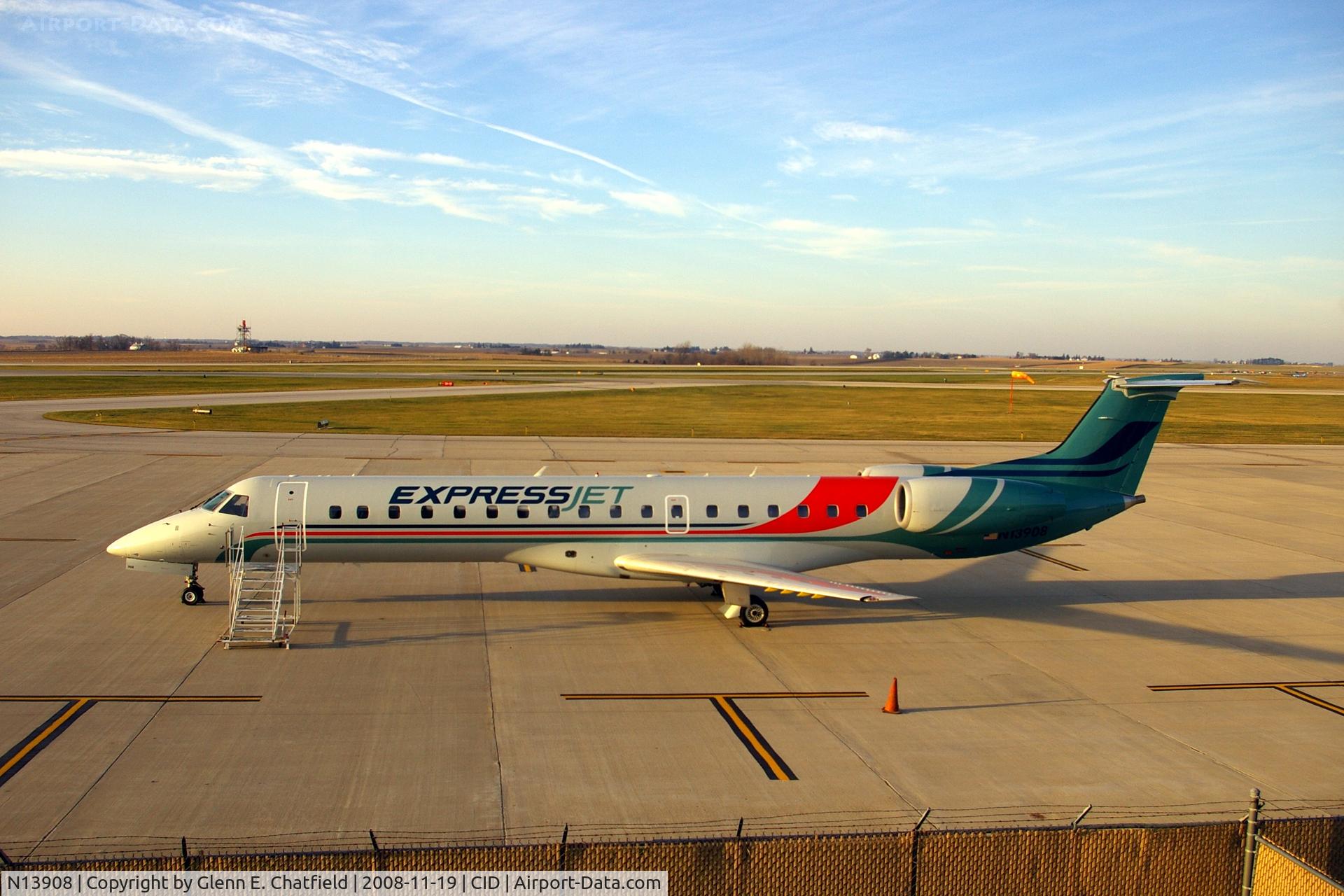N13908, 2001 Embraer ERJ-145LR (EMB-145LR) C/N 145465, Parked in front of the control tower