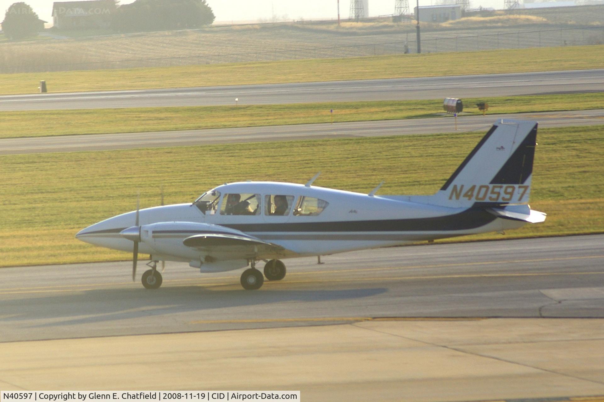 N40597, 1974 Piper PA-23-250 C/N 27-7405344, Taxiing to Runway 31 for departure.  Looking into the sun