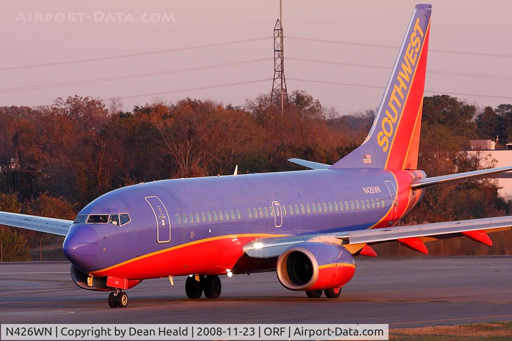 N426WN, 2002 Boeing 737-7H4 C/N 29830, Southwest Airlines N426WN (FLT SWA2860) exitting RWY 5 at Taxiway Echo after arrival from Baltimore/Washington Int'l (KBWI).