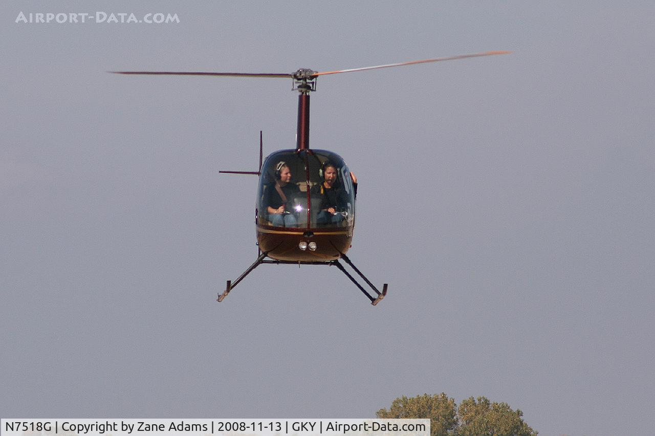 N7518G, 2006 Robinson R22 BETA C/N 4005, At Arlington Municipal - R-22 landing on the ramp.