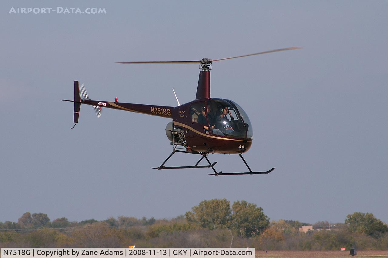 N7518G, 2006 Robinson R22 BETA C/N 4005, At Arlington Municipal - R-22 landing on the ramp.