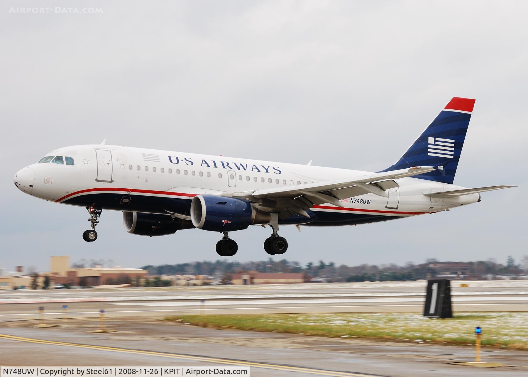 N748UW, 2000 Airbus A319-112 C/N 1311, Landing 28L