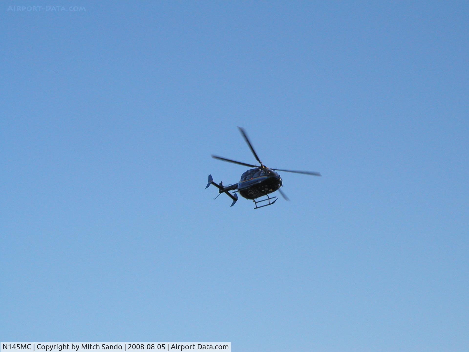 N145MC, 2007 Eurocopter-Kawasaki EC-145 (BK-117C-2) C/N 9120, Mayo 3 departing the parking lot of Lakeville South High School VFR to Mankato (MKT) after training with local Law Enforcement.