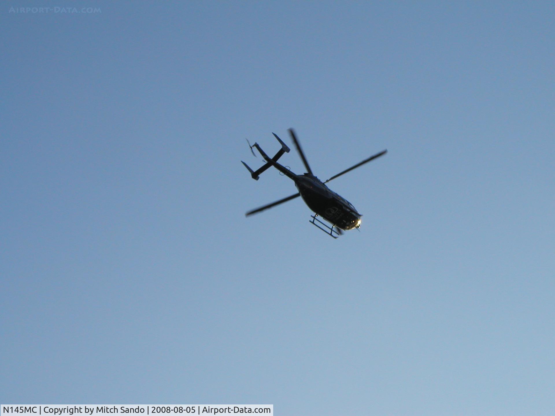 N145MC, 2007 Eurocopter-Kawasaki EC-145 (BK-117C-2) C/N 9120, Mayo 3 departing the parking lot of Lakeville South High School VFR to Mankato (MKT) after training with local Law Enforcement.
