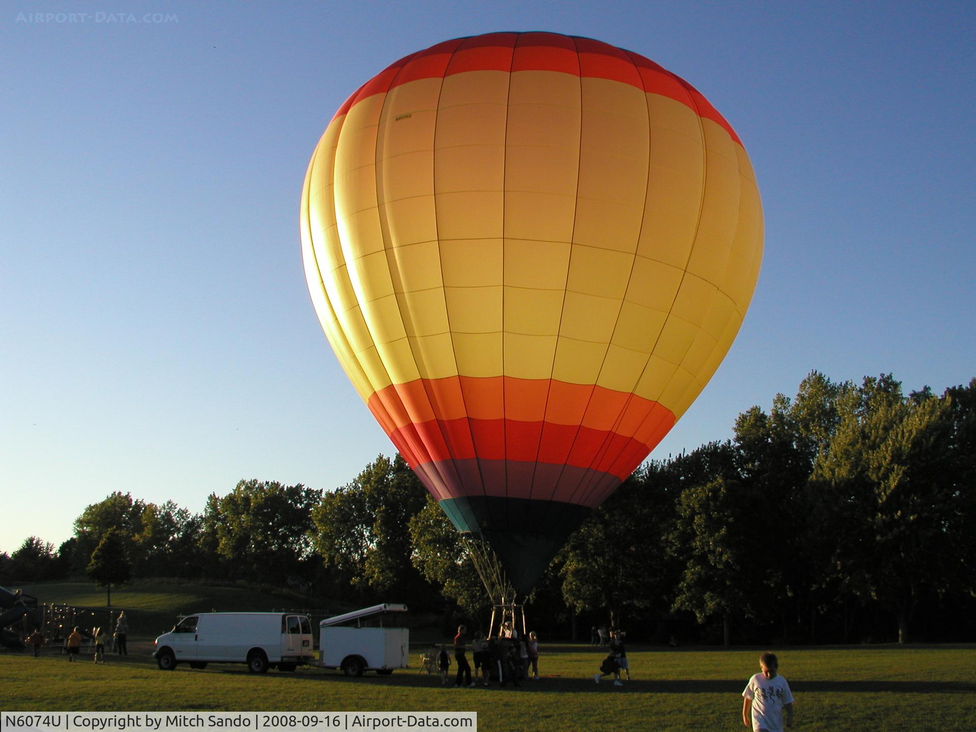 N6074U, 2000 Lindstrand Balloons 77A C/N 5145, Tied down at an elementary school in Lakeville, MN to recruit boy scouts.