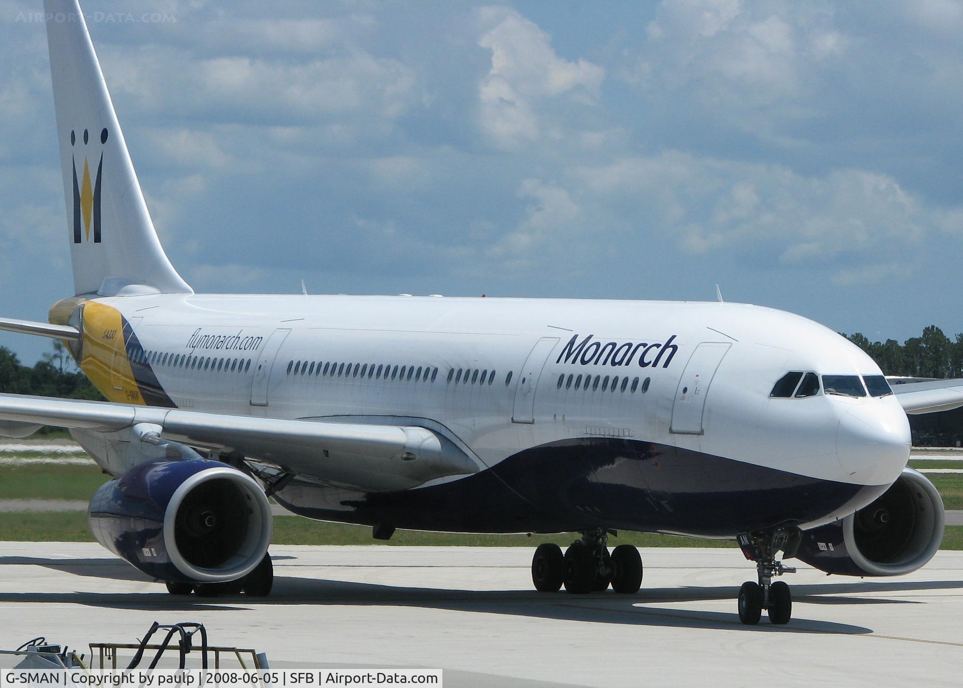 G-SMAN, 1999 Airbus A330-243 C/N 261, Waiting on a tow to the gate at Sanford.