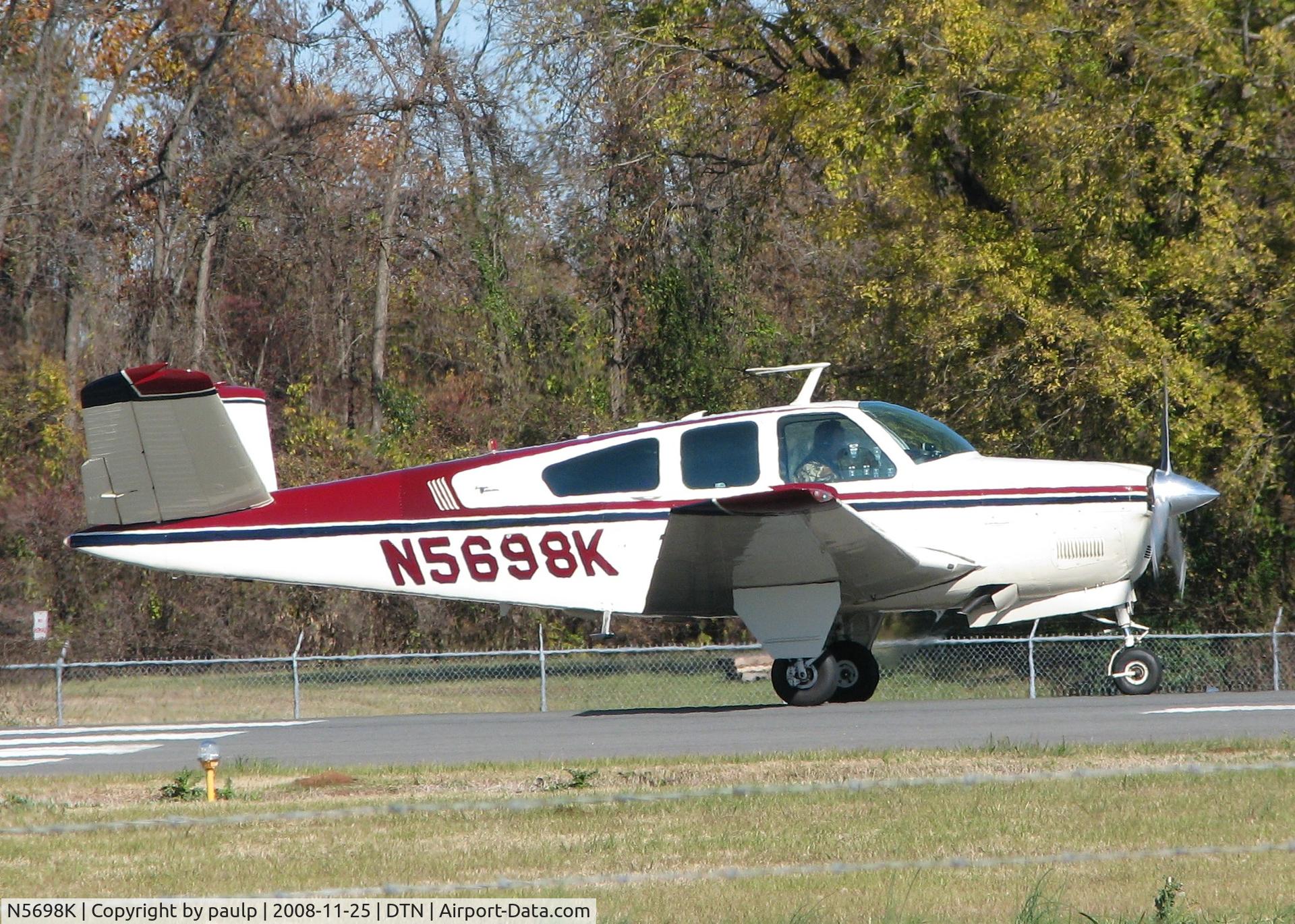 N5698K, 1964 Beech S35 Bonanza C/N D-7622, Taking off from Downtown Shreveport.
