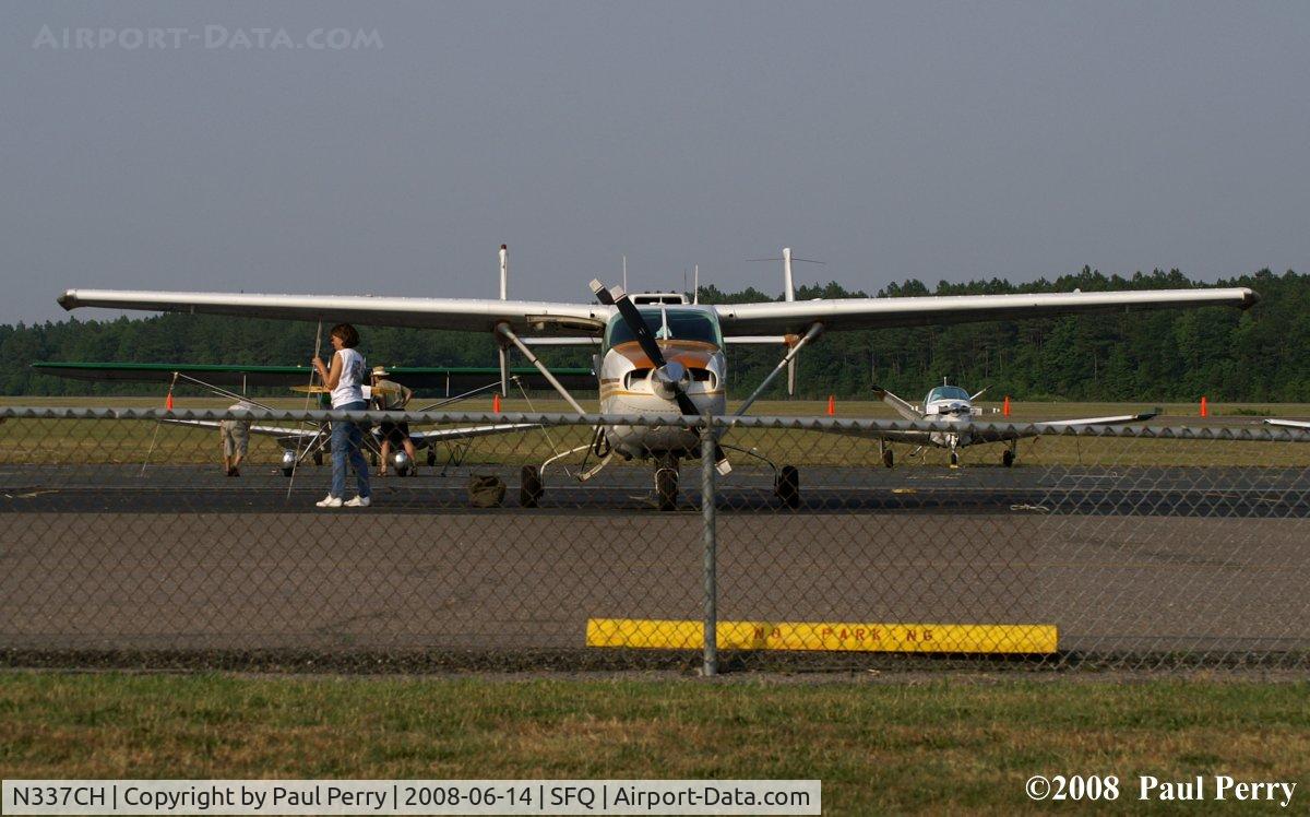 N337CH, 1977 Cessna T337H Turbo Skymaster C/N 33701836, Tying down for the approaching night