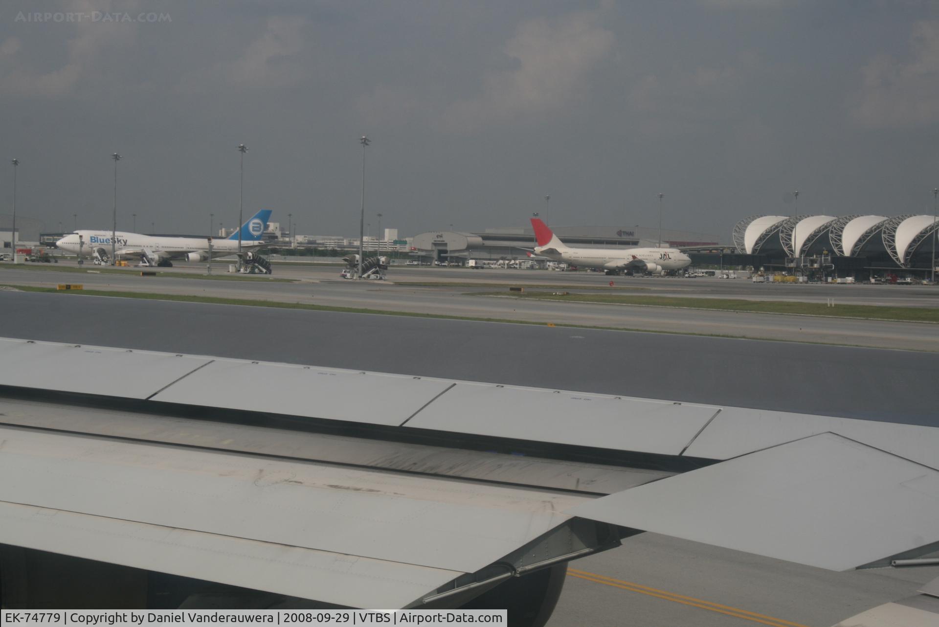 EK-74779, 1993 Boeing 747-422 C/N 26879, Parked on apron - left on the picture (right is JA8914).