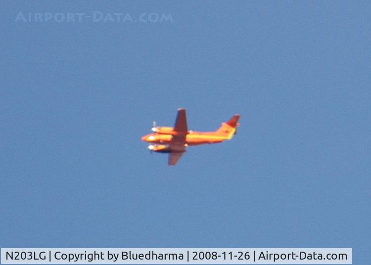 N203LG, 1981 Beech B200 King Air C/N BB-926, Flight for Life Heading West over Columbine High School, Littleton, Colorado