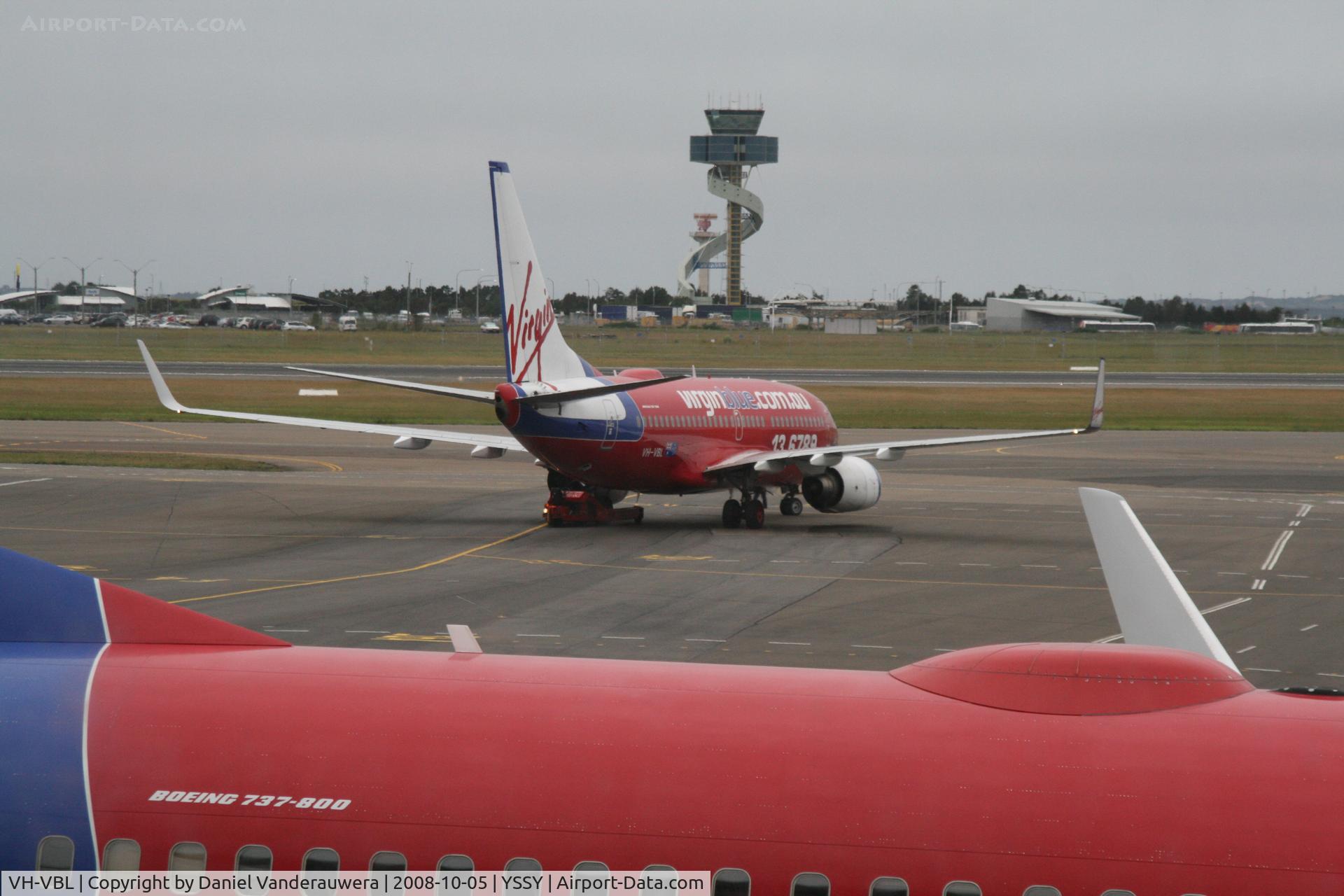 VH-VBL, 2002 Boeing 737-7Q8 C/N 30633, pushed back from gate