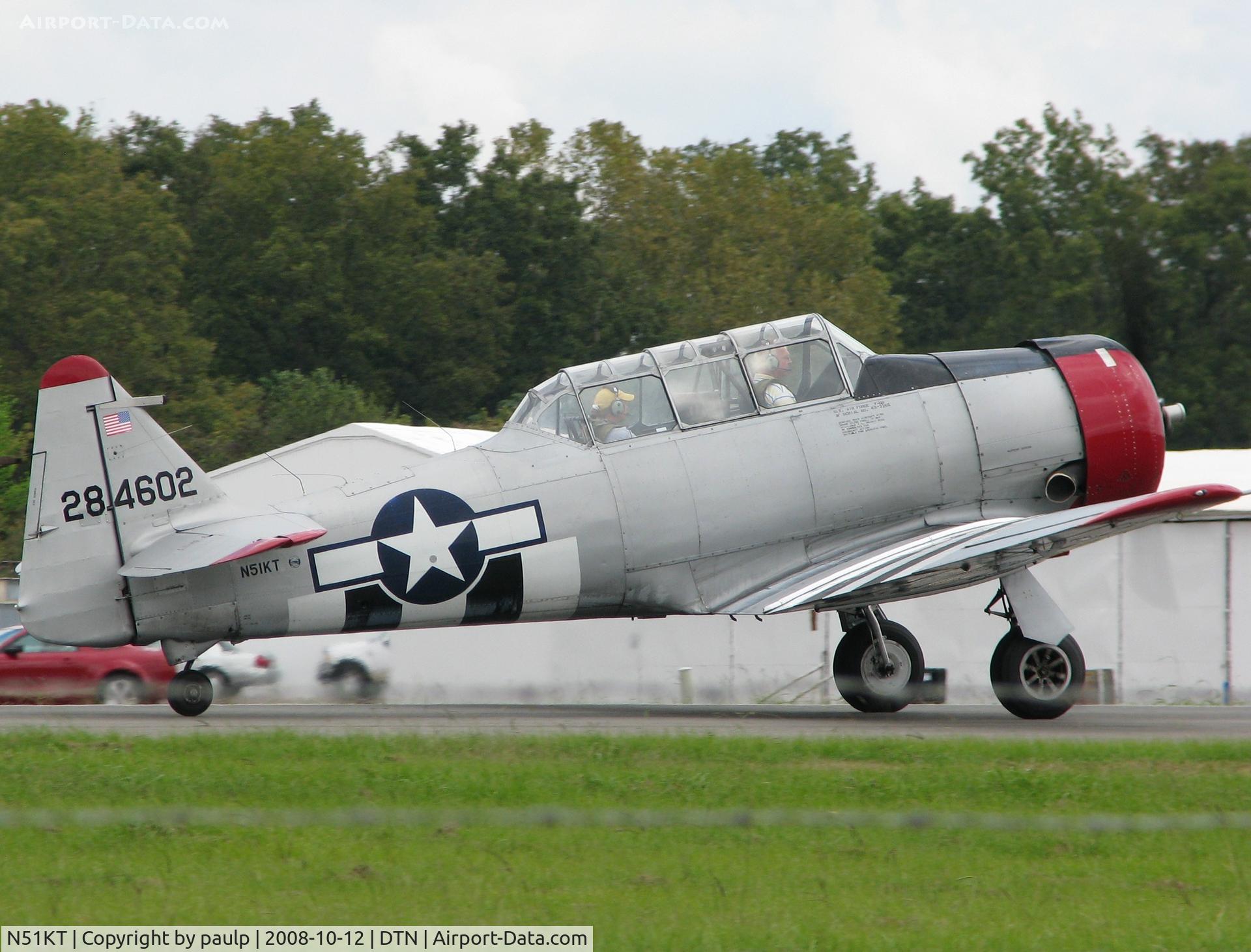 N51KT, 1951 North American T-6G Texan C/N 168-370, Taking off from Downtown Shreveport.