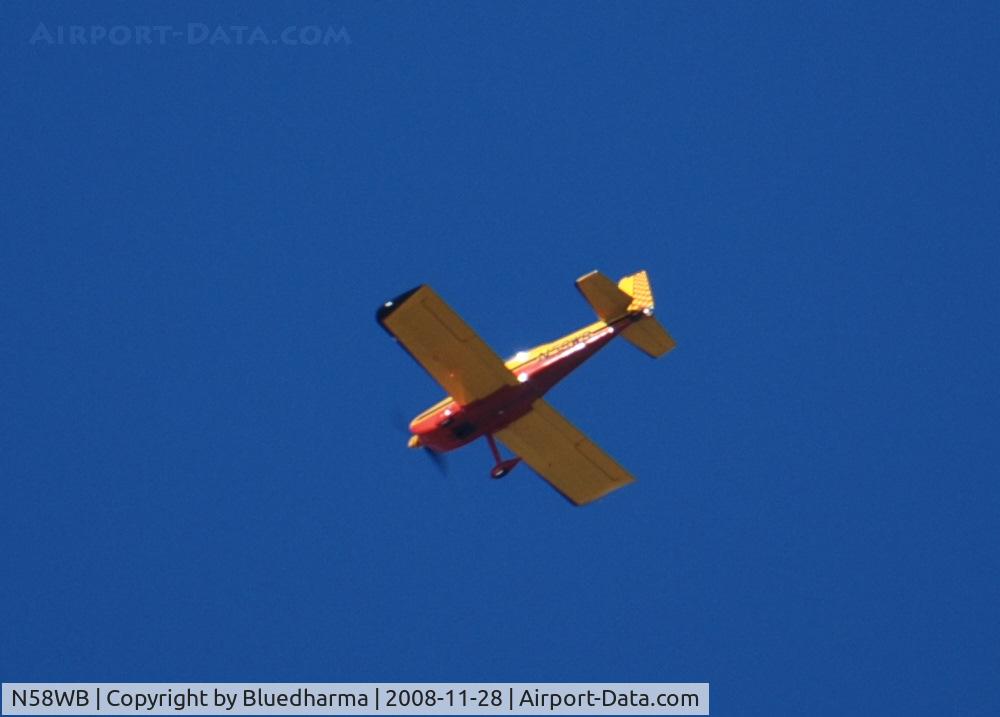 N58WB, 1999 Vans RV-8 C/N 80390, Heading West over Columbine High School, Littleton, Colorado.