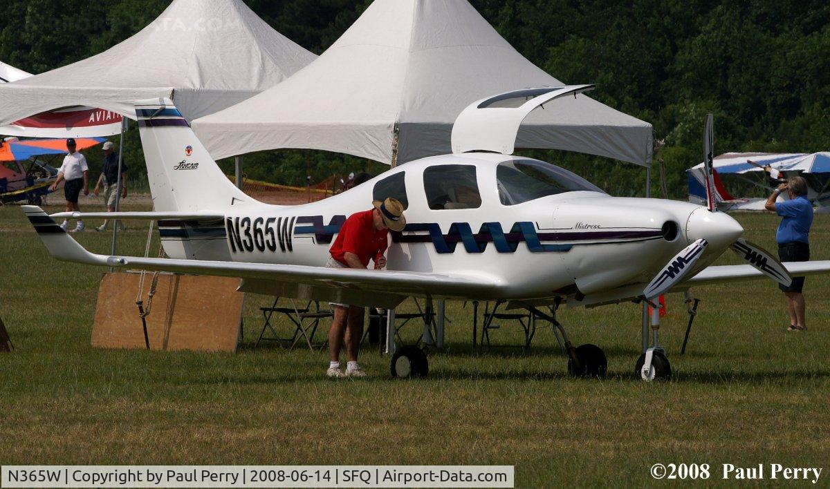 N365W, 1998 Lancair IV-P C/N 002, I like how the corkscrew motif is repeated on the prop blades