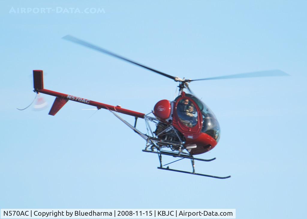 N570AC, 2007 Schweizer 269C C/N S1899, Over KBJC