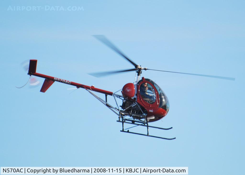 N570AC, 2007 Schweizer 269C C/N S1899, Over KBJC