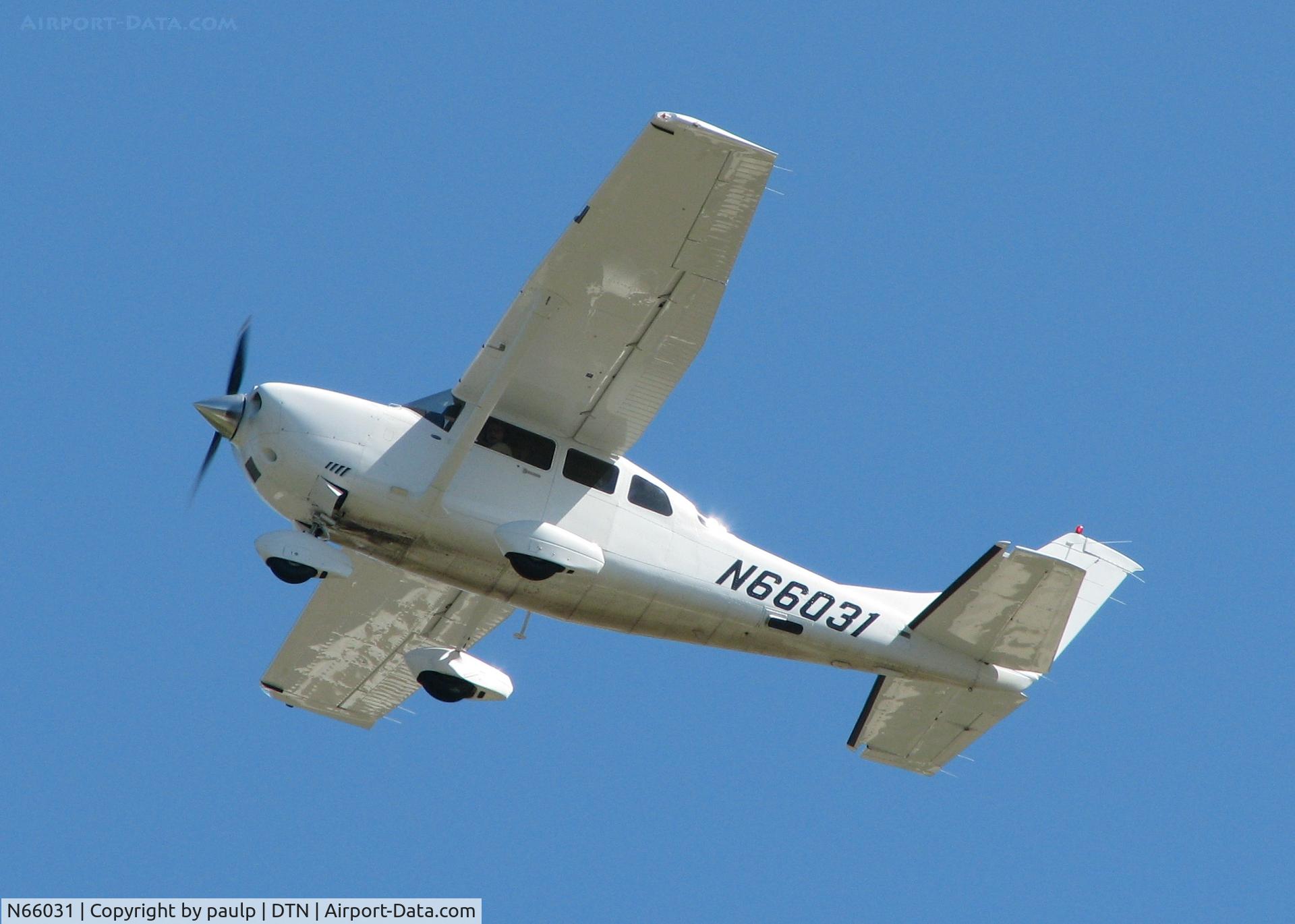N66031, 2005 Cessna T206H Turbo Stationair C/N T20608512, Taking off from Downtown Shreveport.