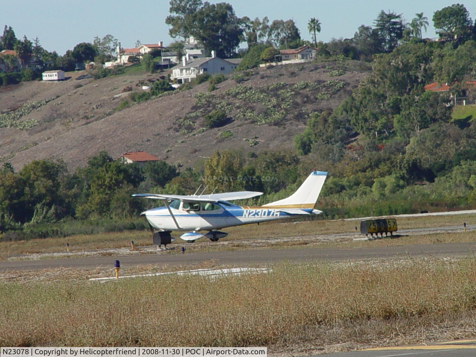 N23078, 1974 Cessna 172M C/N 17264080, Waiting for permission to cross runway