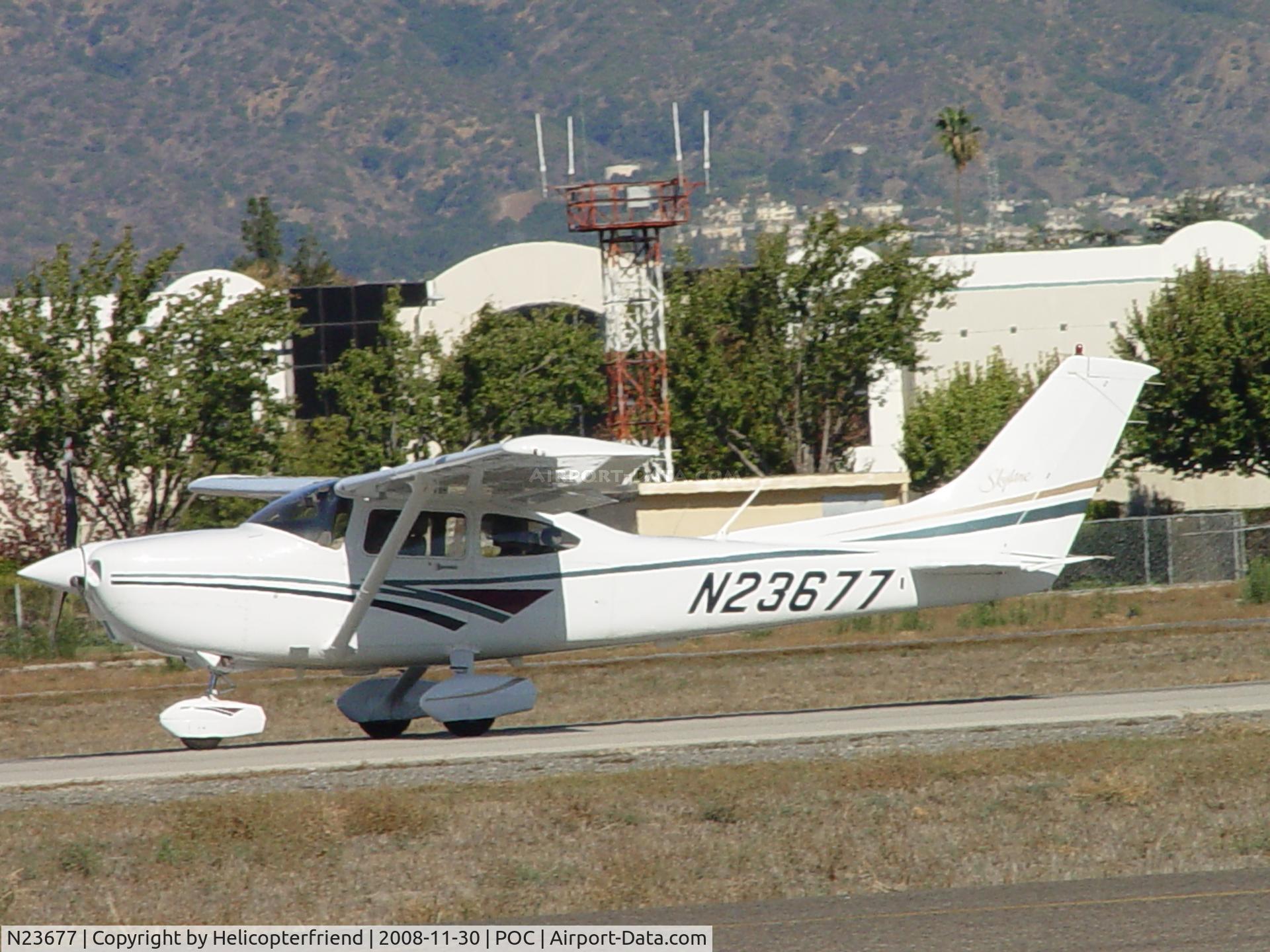 N23677, 1998 Cessna 182S Skylane C/N 18280389, Rolling out after landing