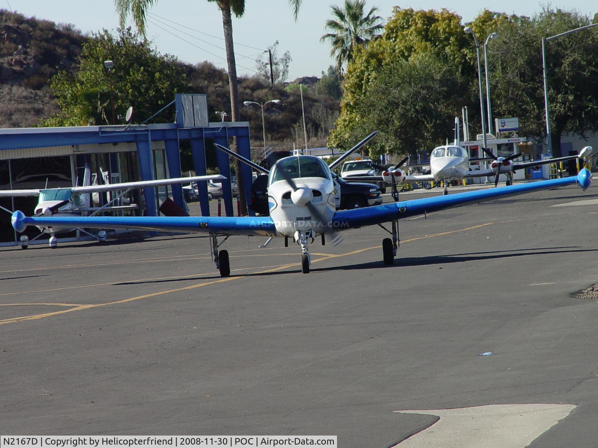 N2167D, 1953 Beech D35 C/N D-3514, Taxiing right at us to get to runway 26L
